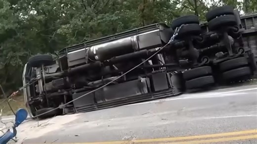 Flatbed incident involving heavy coil load