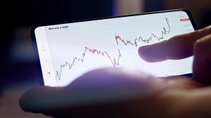 Download Bitcoin cryptocurrency price graph chart on mobile phone screen, cryptocurrency future price prediction concept for free