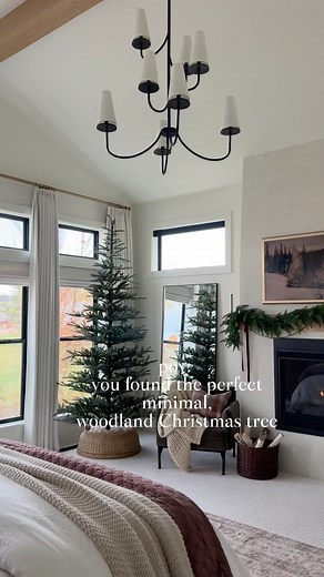 I decided to upgrade our primary bedroom Christmas tree with @kingofchristmas this year, and the 9 foot Noble Fir (unlit) brings the perfect subtle holiday touch! I paired it with my wicker tree collar, plaid pillow and chunky blankets to create the perfect classic, cozy, understated vibe. 🎄✨ I am loving this bare, minimalist look for early November, but stay tuned to see how I decorate this beauty! Comment SHOP for a link 🔗 or head directly to https://liketk.it/4VRbk #kingofchristmas #noblefi