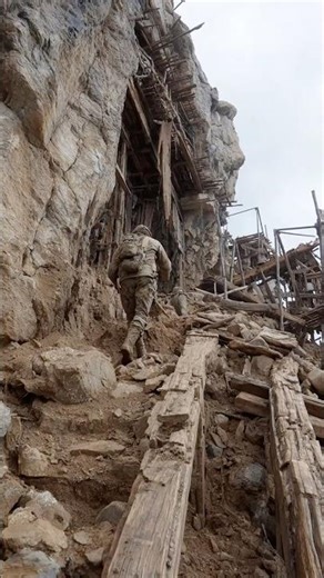 Cliff Collapse Reveals Wooden Beams Trapped Inside Rock Wall