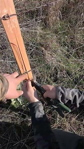 A quick way to fix cedar fence, stay when it's splits.