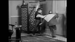 Usa - 1920 - in this silent comedy, a dentist distracted by a pretty girl removes a patient's glasses and mustache rather than his tooth before accidentally sending him out the window.