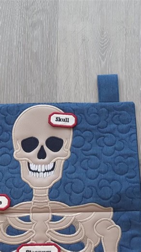 👻 Get Your Halloween Stitch On! ✔️ Stitch this Skeleton Hanger for your Halloween home décor 🎃 ✔️ No complex applique — bones & quilting make it fun to put together ✔️ Fits many hoop sizes: 5x7, 6x10, 7x12 and 9.5x14 👉 Make something hauntingly beautiful today! | Sweet Pea Machine Embroidery