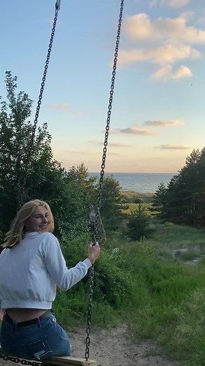 Exploring Palanga: A Serene Sunset Swing Experience