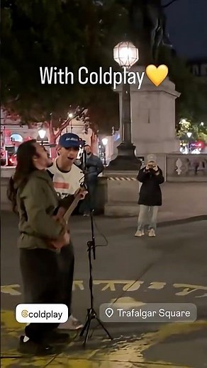 Chris Martin & Street Performer Hanny Junee Perform ViVA LA ViDA