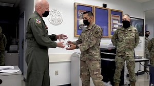 Wing commander awards 2020 Outstanding Airman of the Year trophies at workcenters