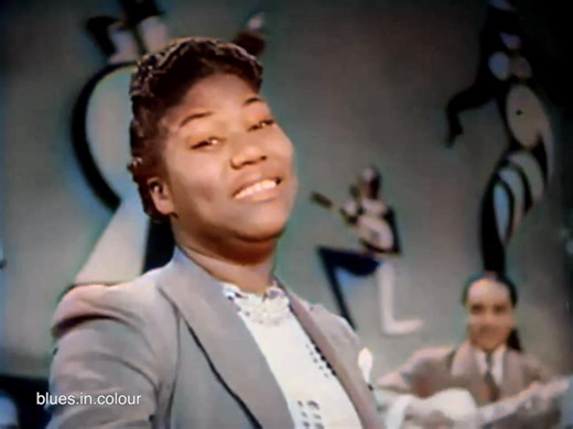 Sister Rosetta Tharpe & Lucky Millinder - 'Lonesome Road' Soundie [Colourised] 1941 Sister Rosetta Tharpe at 26years old with Lucky Millinder's Orchestra in 1941. Soundie recordings were short films designed for playing on a "Panoram" machine, which was a type of juke box that played 16 mm films. I don't make anything colourising and putting these videos together so please support the channel with the link here if you can its greatly appreciated! https://tr.ee/cplUOY9n5L The Lonesome Road was wr