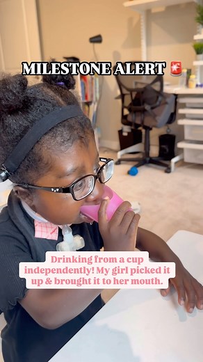 MILESTONE ALERT 🚨 Cali girl is drinking from a cup on her own! One of our biggest obstacles has been getting Cali interested in eating and drinking. When we control all her feeds, this desire for independence is removed. So, we are headed in the right direction. Her awesome speech therapist cheering her on and Cali was pretty excited too🫶🏿🙌🏿 . . #motherhood #eatingbymouth #feedingtherapy #speechtherapy #seattlefamily | Cali Joy's Journey