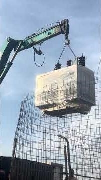 Installing a transformer inside the fence using a crane @ Kwanar Dan Gora, Kano, Nigeria.