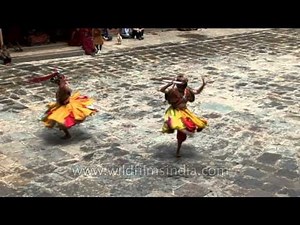 Masked dance known as Cham dance being performed in Bhutan