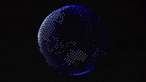 Constellation of drones form globe at Tokyo opener