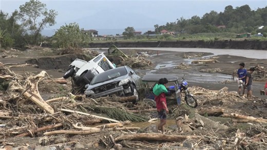 Buildings ruined, vehicles buried in mud after deadly tropical storm in Philippines