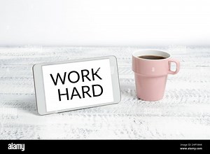 Sign displaying Work Hard, Business overview Laboring that puts effort into doing and completing tasks Wireless Communications Voice And Video Calls G Stock Photo - Alamy