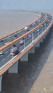 Majestic Hangzhou Bay Bridge Check out the magnificent Hangzhou Bay Bridge in Zhejiang Province! The 36-kilometer-long bridge is one of the world's longest trans-oceanic bridges, connecting Jiaxing and Ningbo. It reduces the travel distance between Ningbo and Shanghai by 120 kilometers, bringing regional economic connections closer. | WE ARE CHINA