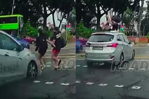 Jaywalking pedestrians sent flying metres away after collision with taxi at Paya Lebar