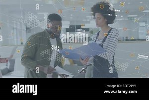 Two colleagues reviewing plan in tech office while speaking, displaying graphics highlighting zones. Collaboration, teamwork, brainstorming, digital interface, architectural, enterprise, innovation Stock Video Footage - Alamy