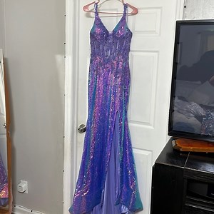 I am selling my prom dress because it is taking up space in my closet