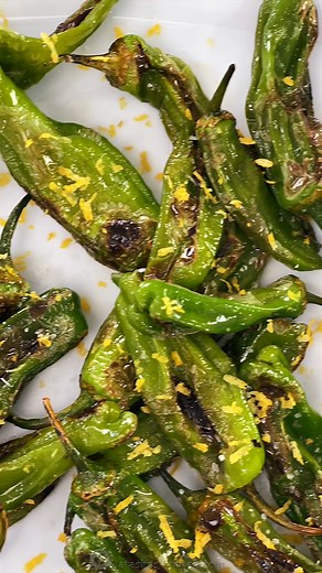 These Blistered Shishito Peppers are a restaurant-style appetizer you can easily make at home. RECIPE: https://natashaskitchen.com/blistered-shishito-peppers/ | NatashasKitchen.com