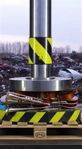 Hydraulic press smashing musical instruments. Satisfying. #hydraulicpress