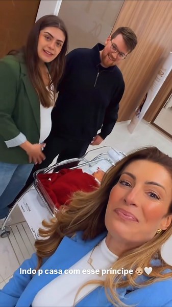 Elaine Michely, Luma César, and Ed Beccle documenting Arthur’s discharge from the maternity ward ...