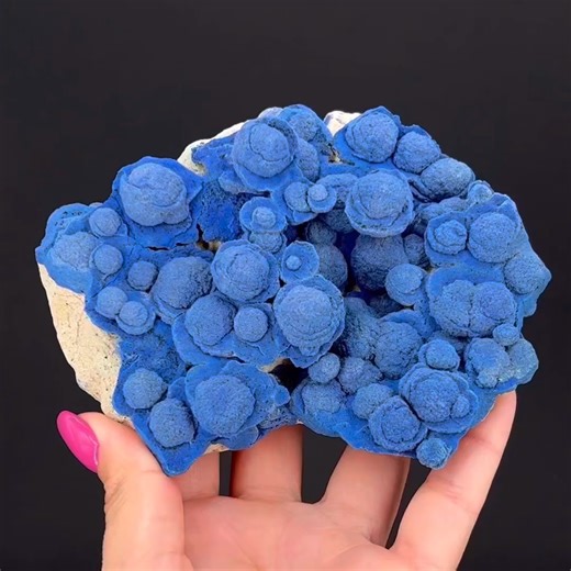 I feel like this belongs in a sci-fi movie setting… perhaps a Star Wars flying chase scene! These unusual azurite concretions came out of New Mexico over a period of a few years and seems to have stopped producing. Varying degree of quality was produced, with few specimens having this consistent, strong color and no damage at this size. Apparently, this strangely situated mine was once economic for copper and was abandoned 40 years ago. The actual best copper ore here was a very heavy petrified 