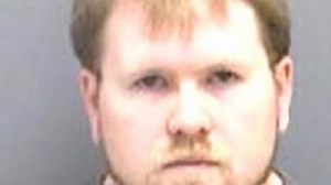 Matt Birkmire accused of hiding camera in bank's bathroom