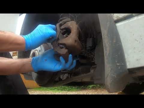 Replace BMW i3 front brake pads