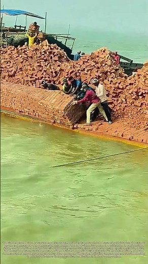 Stacking Bricks: How a River Barge Prepares a Flood Barrier Foundation