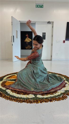 SPIC MACAY: Ashoka University Chapter on Instagram: "We conclude VIRASAT today with stories of kathakars, held in breath and time by the soulful notes of Hindustani music Shri Vishal Krishna performing Kathak | Pandit Sajan Mishra ji performing Hindustani Vocal Colour the space with your presence Gates open at 4:30pm || VIRASAT || 25 January [Alt text: video of a dancer seated low within a circular rangoli. She makes precise hand gestures before getting up and playfully throwing up the flowers.