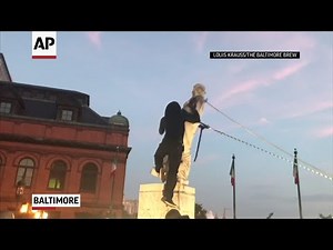 Columbus statue toppled by protesters in Baltimore