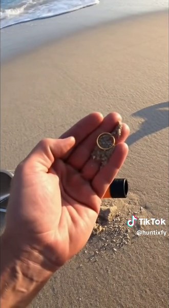 Discovering a Gold Ring on the Beach with a Metal Detector
