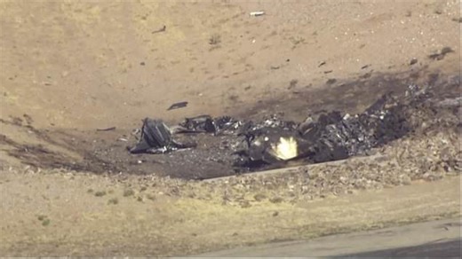 Helicopter footage shows wreck of 'mid-air collision' that left two dead