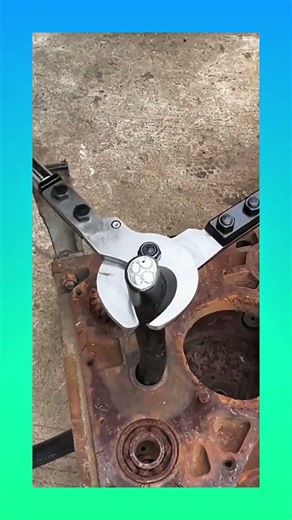 Heavy-duty scissors cutting through a thick cable, slicing it cleanly with strong pressure.