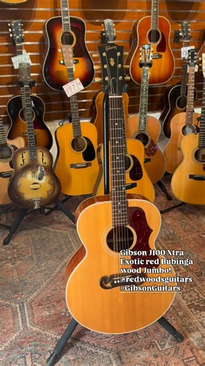 Redwoods Vintage Guitars on Instagram: "Exotic Red Bubinga Gibson J-100 Xtra Jumbo acoustic guitar … this one’s a cannon and plays smooth as silk. When it’s time to kill banjos, this guitar is for you. Dm to purchase we’ve only got one and it’s a stunner. #RedwoodsGuitars #GibsonAcoustic #GibsonGuitars"
