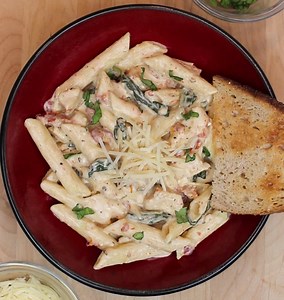 Looking for something tasty and easy to make? Try our Marukan Creamy Tuscan Chicken Pasta, featuring our Seasoned Gourmet Rice Vinegar! | Marukan Vinegar