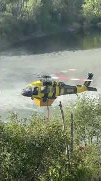 Sikorsky UH-60A Blackhawk Helicopter Getting Water B&O Wildfire in Okanogan, WA N860NH