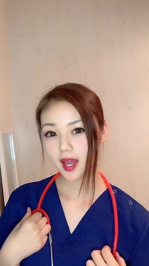 Healthcare Professional Demonstrates Stethoscope Usage