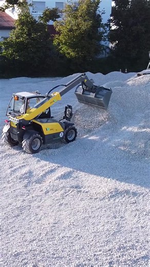 Wacker Neuson | Clean. Compact. All-electric. Drone view of the TH412e in action – just power and silence. #WackerNeuson #TH412e #ZeroEmission... | Instagram