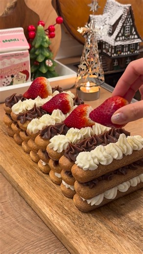 No Oven? No Problem Here’s a No Bake Cake for you 😊 Ingredients: 24 pcs. Ladyfingers biscuits Strawberries for toppings Chocolate Ganache: 200g Chocolate for melting 130g cream Cream icing: 200g cream 1 pack cream stabilizer (optional) 1/4 cup powdered sugar 1 tsp. Vanilla paste 1. To make your ganache, melt your chocolate in the microwave. Once melted, add your hot cream. Mix well, then cover with plastic wrap and let it chill for 15-20 minutes or until the ganache becomes paste-like. Set asid