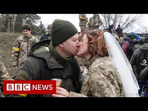 Military couple marry on Ukrainian front line amid war with Russia - BBC News