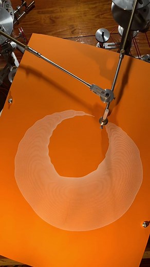 Manual manipulation #drawingmachine #gandyworks #analog #ratio #harmonograph #processvideo #timelapse #whiteink #satisfying #drawing #orange #art #artist #machinist