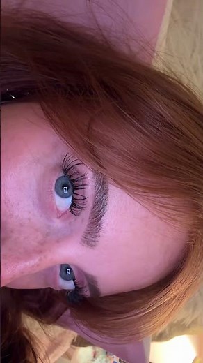 Redhead Showing Off Her Eyelashes While Lying on a Bed#redhead #freckles #longlashes #bed