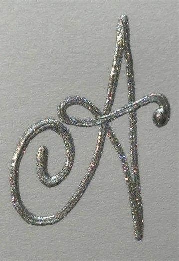 Starting a new series ✨ Handlettering every capital letter in cursive with this stunning silver glitter gel pen… beginning with A. There’s something magical about a single letter — the way one simple shape can be the beginning of thousands of names, stories, and identities. Every name starts somewhere… and today it starts here. If your name begins with A, this one is for you 🤍 Tell me in the comments what letter I should write next… and tag someone whose name starts with A so they can see it sp