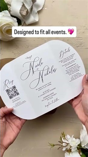 This creative photo wedding invitation features a unique fold design, elegant script details, and a