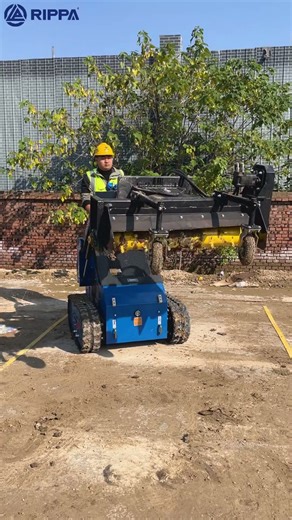 Rippa RS04 mini skid steer with the Harley Rake attachment.