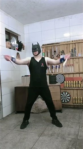 Batman recreates Bruce Lee's punches and nunchaku moves