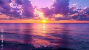 A stunning sunset over the ocean, featuring vivid shades of purple, pink, and orange mirrored on the tranquil waters, forming a peaceful and enchanting seascape