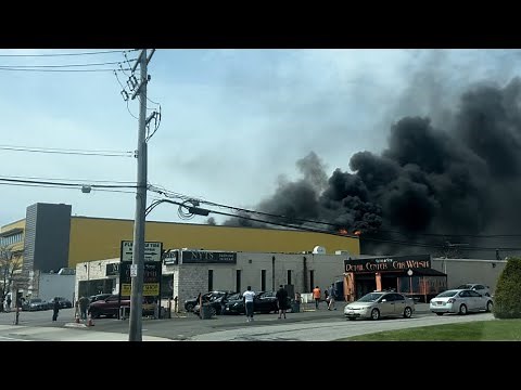 HEAVY FIRE ON THE ROOF OF STORAGE FACILITY - PLAINVIEW NY