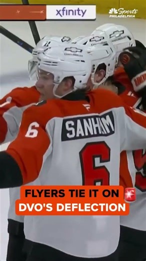 Christian Dvorak deflects a Porter Martone shot into the net to tie up Flyers vs Red Wings