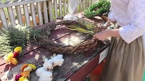 5.8K views · 263 reactions | Here’s a little quarantine craft inspiration from the archives! Watch Amanda make a spring wreath on a grapevine base, using maidenhair fern, lotus pods, cotton, and assorted straw flowers, then scavenge your craft supplies or backyard for similar supplies and show us what you make! | Colonial Williamsburg | Facebook